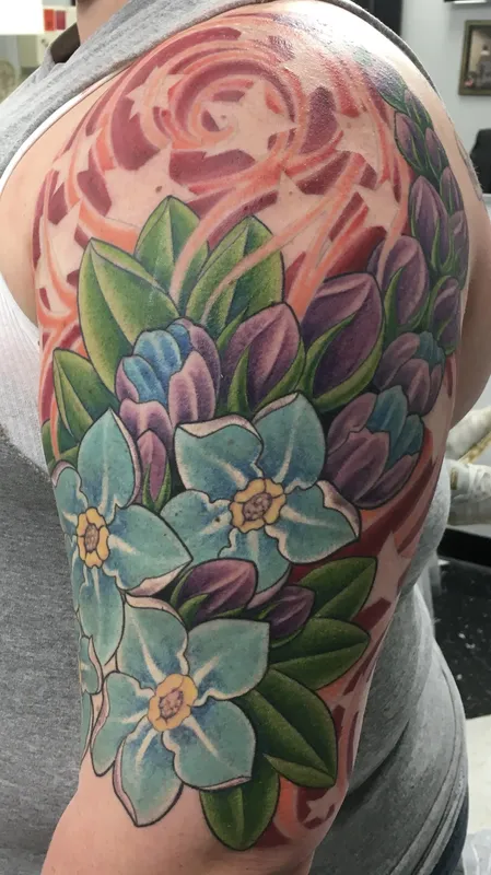 Custom floral tattoo by Aaron Sangenitto at Tattooz Ink in Redding, California